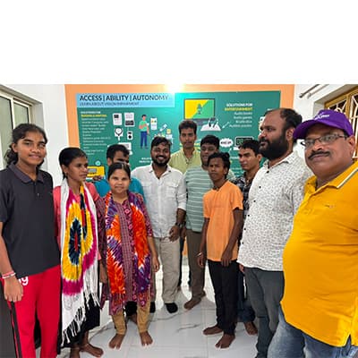 Group photo of visually impaired students and facilitators at WE4YOU Centre